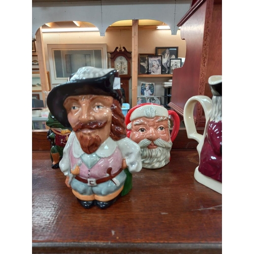 300 - A selection of character and Toby jugs etc including Royal Doulton Santa Claus, Portmeirion Welsh dr... 