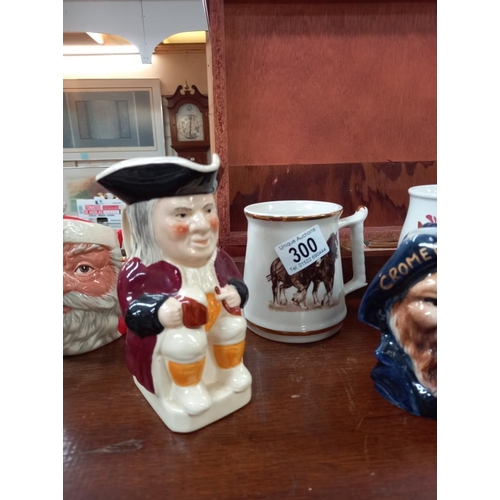 300 - A selection of character and Toby jugs etc including Royal Doulton Santa Claus, Portmeirion Welsh dr... 