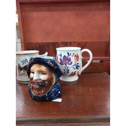 300 - A selection of character and Toby jugs etc including Royal Doulton Santa Claus, Portmeirion Welsh dr... 