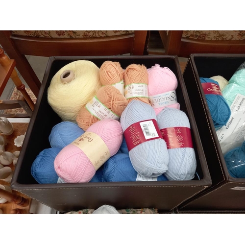 315 - A large quantity of knitting wool and knitting needles in 2 storage boxes COLLECT ONLY