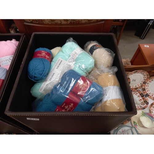 315 - A large quantity of knitting wool and knitting needles in 2 storage boxes COLLECT ONLY