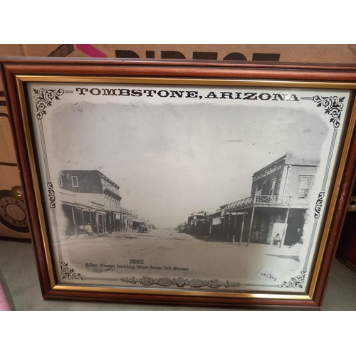 317 - A quantity of framed prints of tombstone Arizona etc and flags