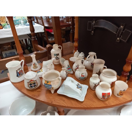 319 - A good selection of crested china including Arcadian, Shelley and Goss