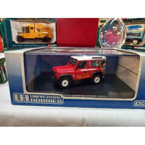 321 - A selection of boxed diecast including universal hobbies Land rover etc includes boxed Royal Crest t... 