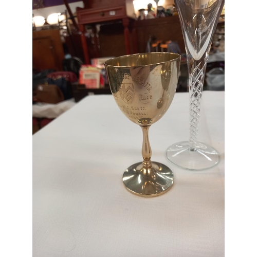 324 - A pair of tall air twist stem glasses and 3 silver plated goblets