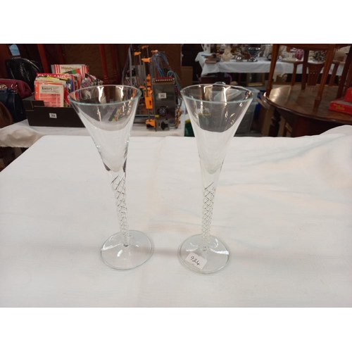 324 - A pair of tall air twist stem glasses and 3 silver plated goblets