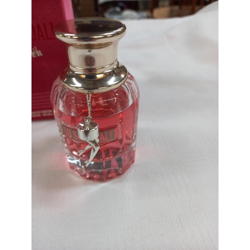 339 - A partially used bottle of Scandal by Jean Paul Gaultier in box (approximately 3/4 full)