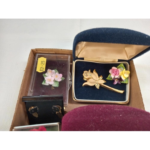 350 - A quantity of floral brooches and earrings