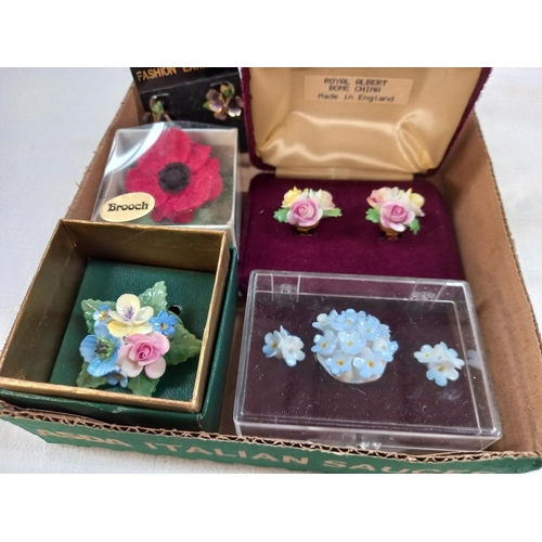 350 - A quantity of floral brooches and earrings