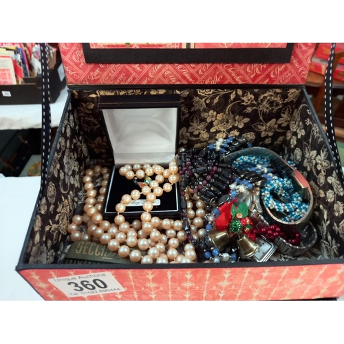 360 - A jewellery box with costume jewellery including pearls