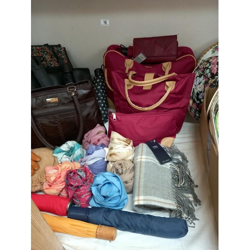 16 - A good lot of ladies handbags, umbrellas, silk scarves etc