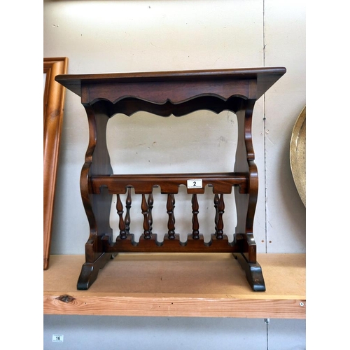 2 - A dark wood stained tea table/magazine rack