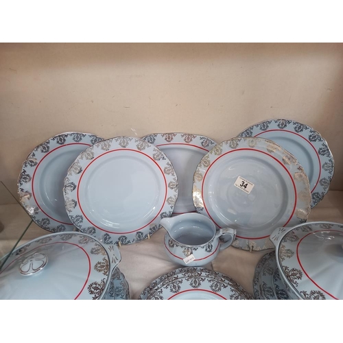 34 - An Alfred Meakin Harmony Venetian blue dinner service COLLECT ONLY