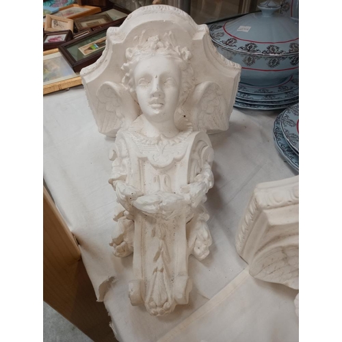 35 - A pair of  plaster figural wall bracket shelves COLLECT ONLY