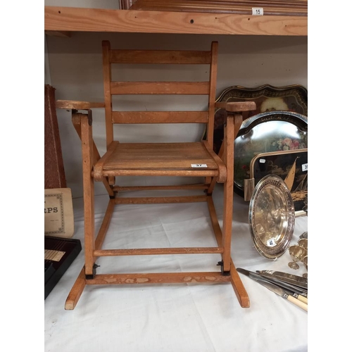 37 - A vintage child's folding rocking chair COLLECT ONLY