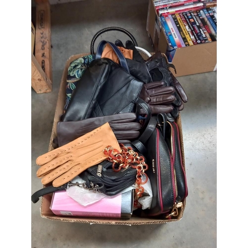 55 - A quantity of old handbags and gloves. COLLECT ONLY