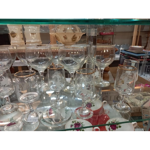 111 - A good lot of drinking glasses on 2 shelves COLLECT ONLY