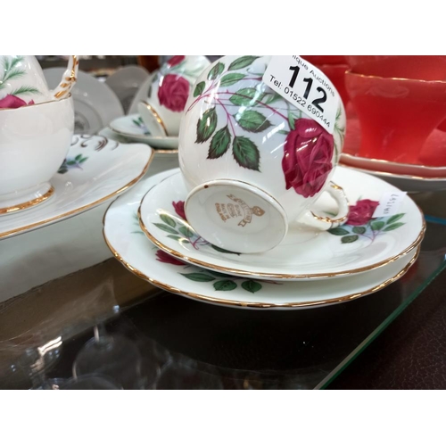 112 - A 12 piece Aynsley tea set and a 15 piece Delphine tea set COLLECT ONLY