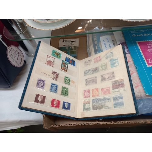 113 - A box of ephemera , sheet music, album of cigarette cards including silks, album of old cheques incl... 