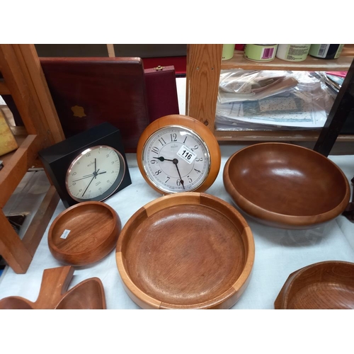 116 - A good lot of wooden bowls and clocks