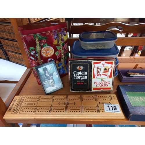 119 - A quantity of games and home office items, cribbage board, dominoes, plus note books, envelopes, hig... 