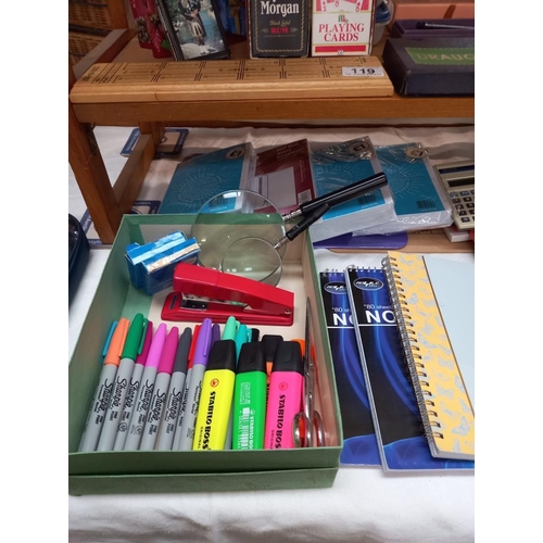 119 - A quantity of games and home office items, cribbage board, dominoes, plus note books, envelopes, hig... 