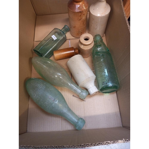 124 - A quantity of stoneware and Codd bottles etc including Talbot herbal remedies Boston & Spalding, R W... 