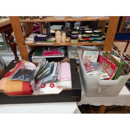 132 - A quantity of sewing and craft items including material, good lot of cutting dies etc