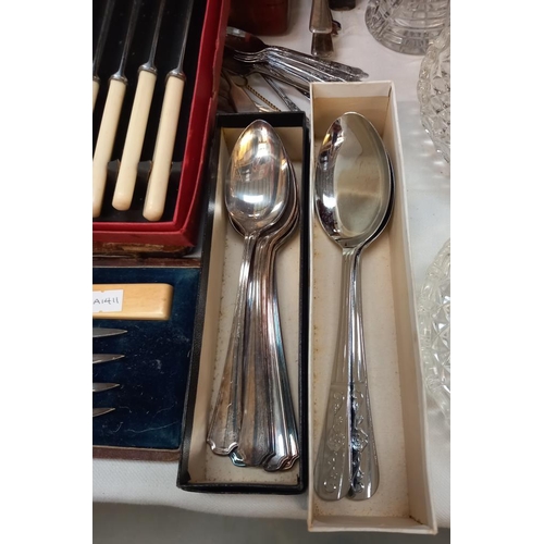 133 - A quantity of cased cutlery etc