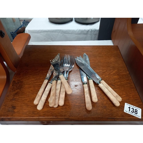 138 - A wooden case & quantity of cutlery