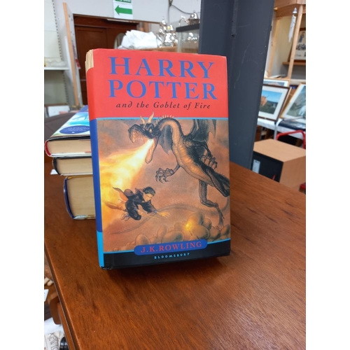 139 - 4 hardback Harry Potter books - Order of the Phoenix is 1st edition other 3 are 10th editions on the... 