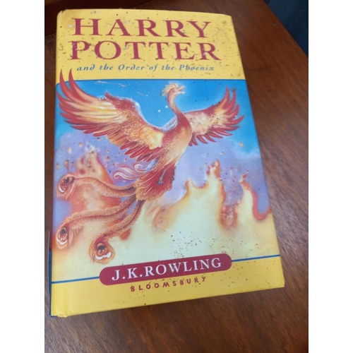 139 - 4 hardback Harry Potter books - Order of the Phoenix is 1st edition other 3 are 10th editions on the... 