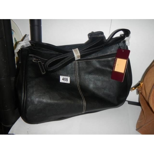 408 - A new Tanners holdall.