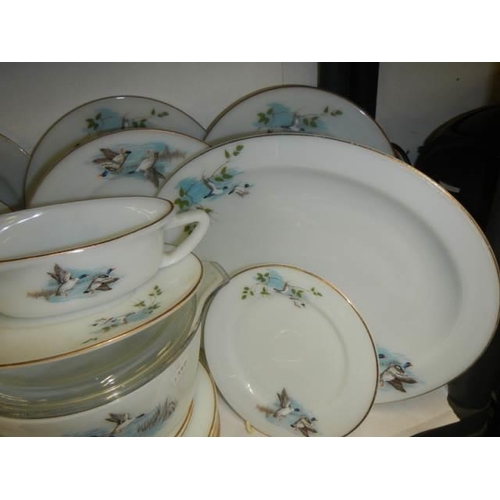 415 - Approximately 20 pieces of vintage Pyrex dinner ware, COLLECT ONLY.