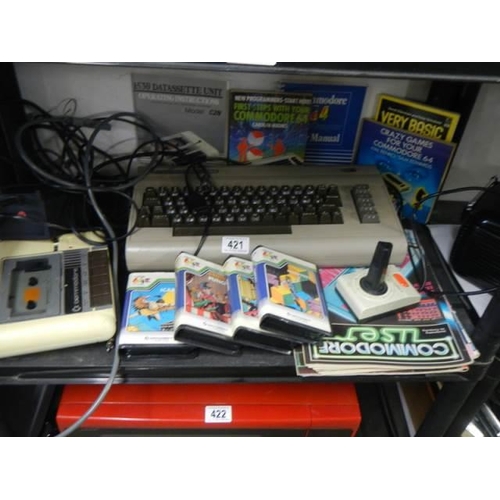 421 - A Commodore console, games etc.,