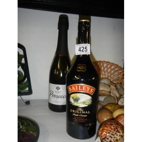 425 - A bottle of Bailey's and a bottle of Prosecco.