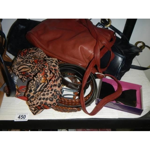 450 - A mixed lot of handbags, belts etc.,