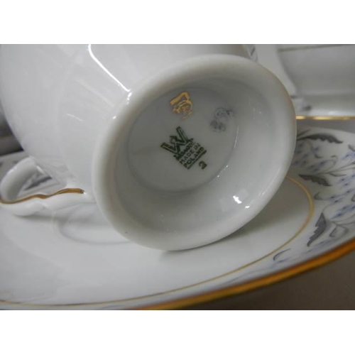 491 - An eighteen piece porcelain tea set. COLLECT ONLY.