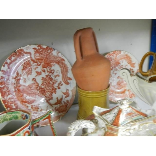 496 - A mixed lot of ceramic plates, teapot etc., COLLECT ONLY.