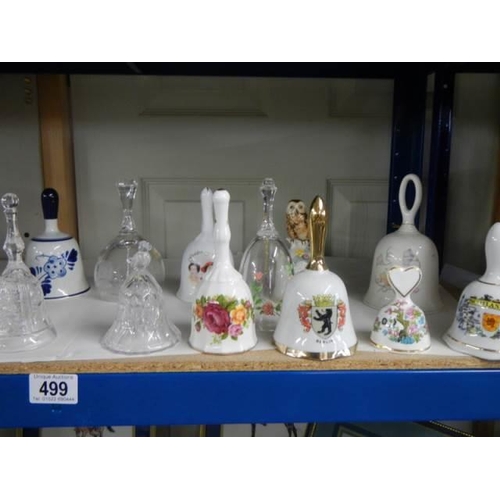 499 - Eighteen glass and china bells. COLLECT ONLY.