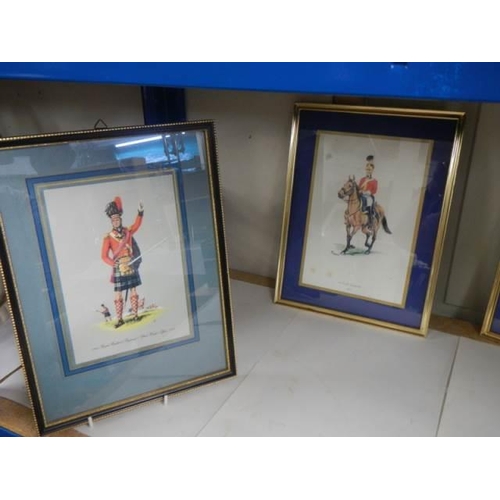 500 - Four framed and glazed military uniform prints.