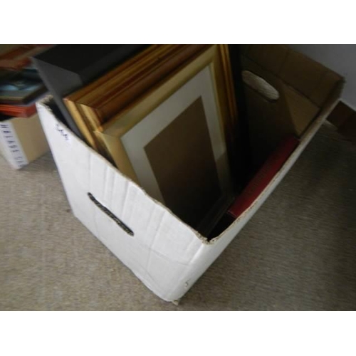 544 - Two boxes of new picture frames.