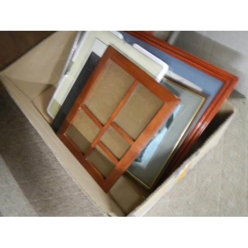 544 - Two boxes of new picture frames.