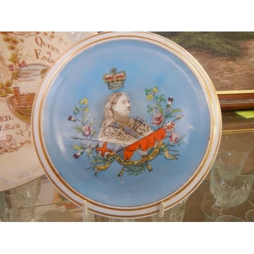 570 - A Victorian commemorative plate and teapot stand.