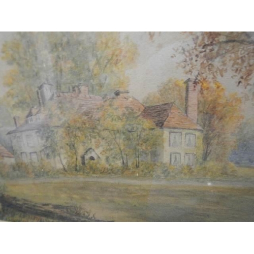 600 - A framed and glazed early 20th century watercolour of a manor house, COLLECT ONLY.