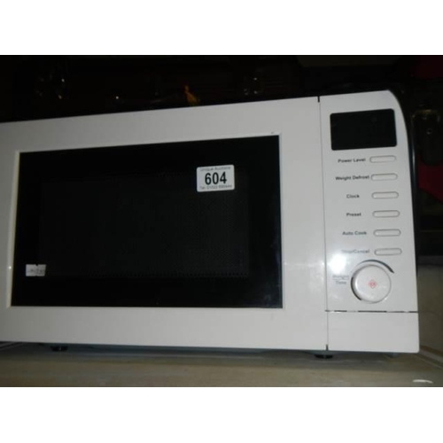 604 - A microwave oven. COLLECT ONLY.