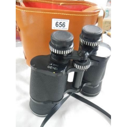 656 - A cased pair of binoculars.