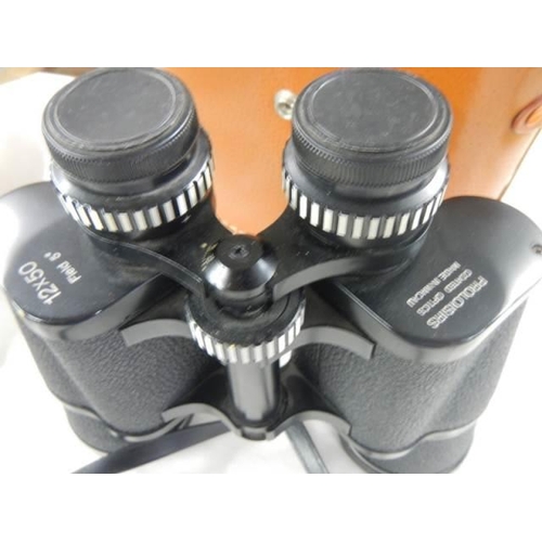 656 - A cased pair of binoculars.