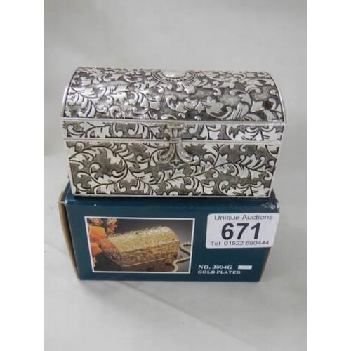 671 - A boxed silver plate trinket box.