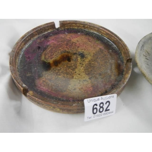 682 - A studio pottery coaster and ash tray.